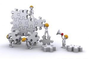 Business team work building a puzzle. Business developing concept.